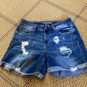Distressed denim shorts